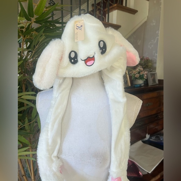 Bunny hat, new with tags super cute when you press the pause the ears go up - Picture 2 of 13